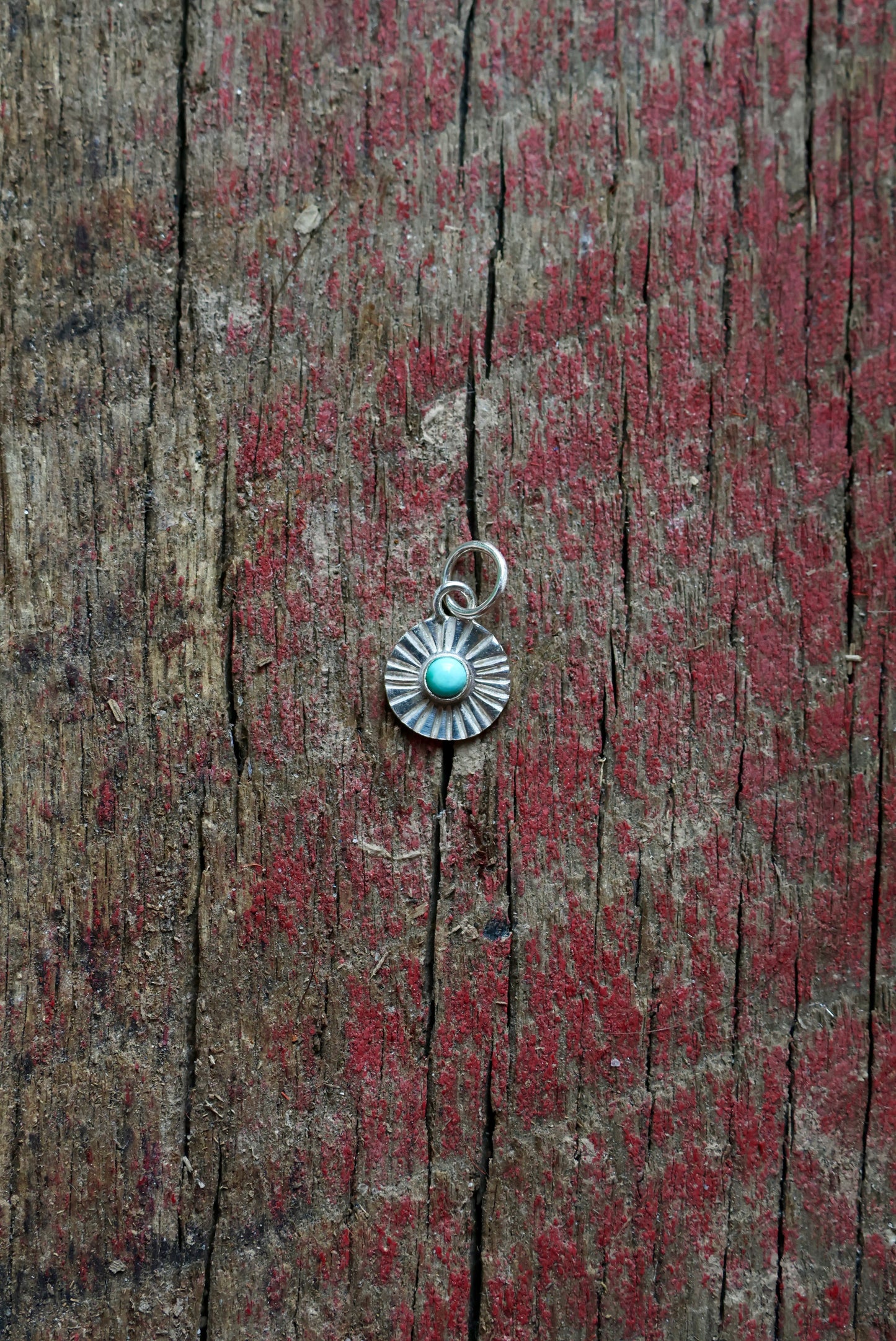 Sun Ray Stamped Turquoise Charm